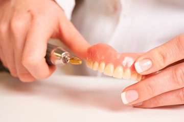 dentures being repaired